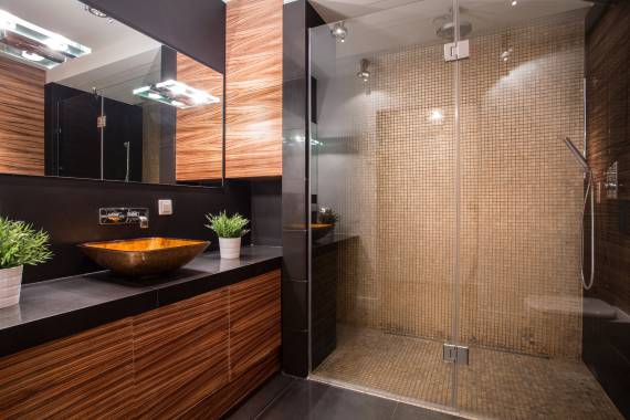 New modern bathroom with fancy shower on the wall